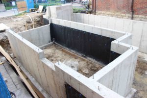 photo of waterproofing foundation walls of garage